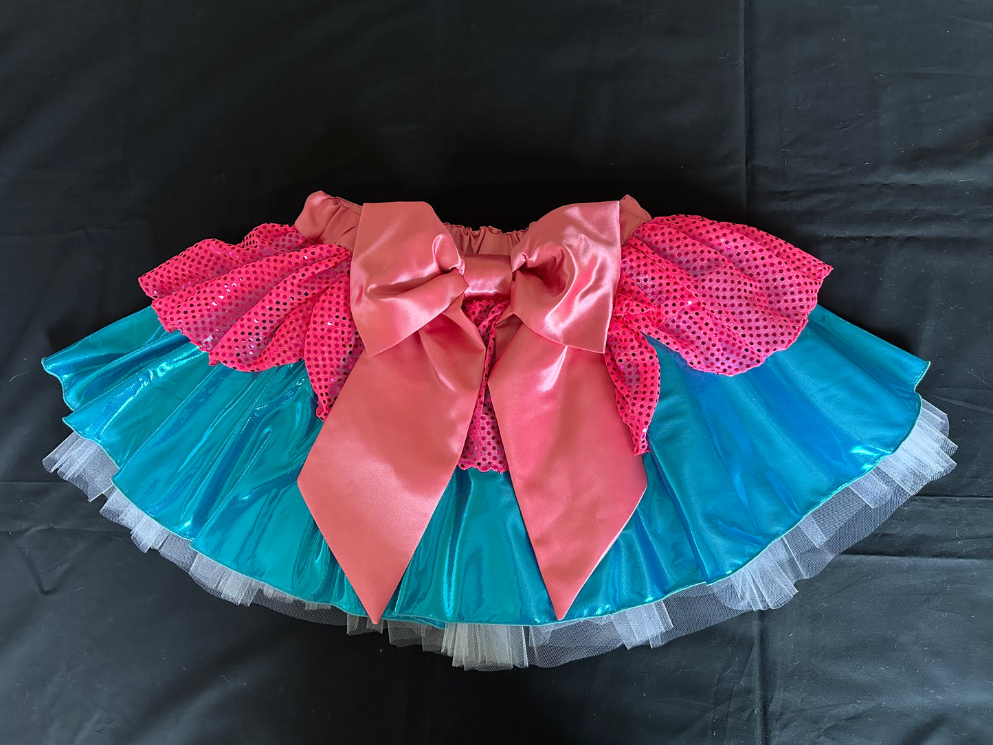 Size XS LAST UNIT Turquoise/Hot Pink