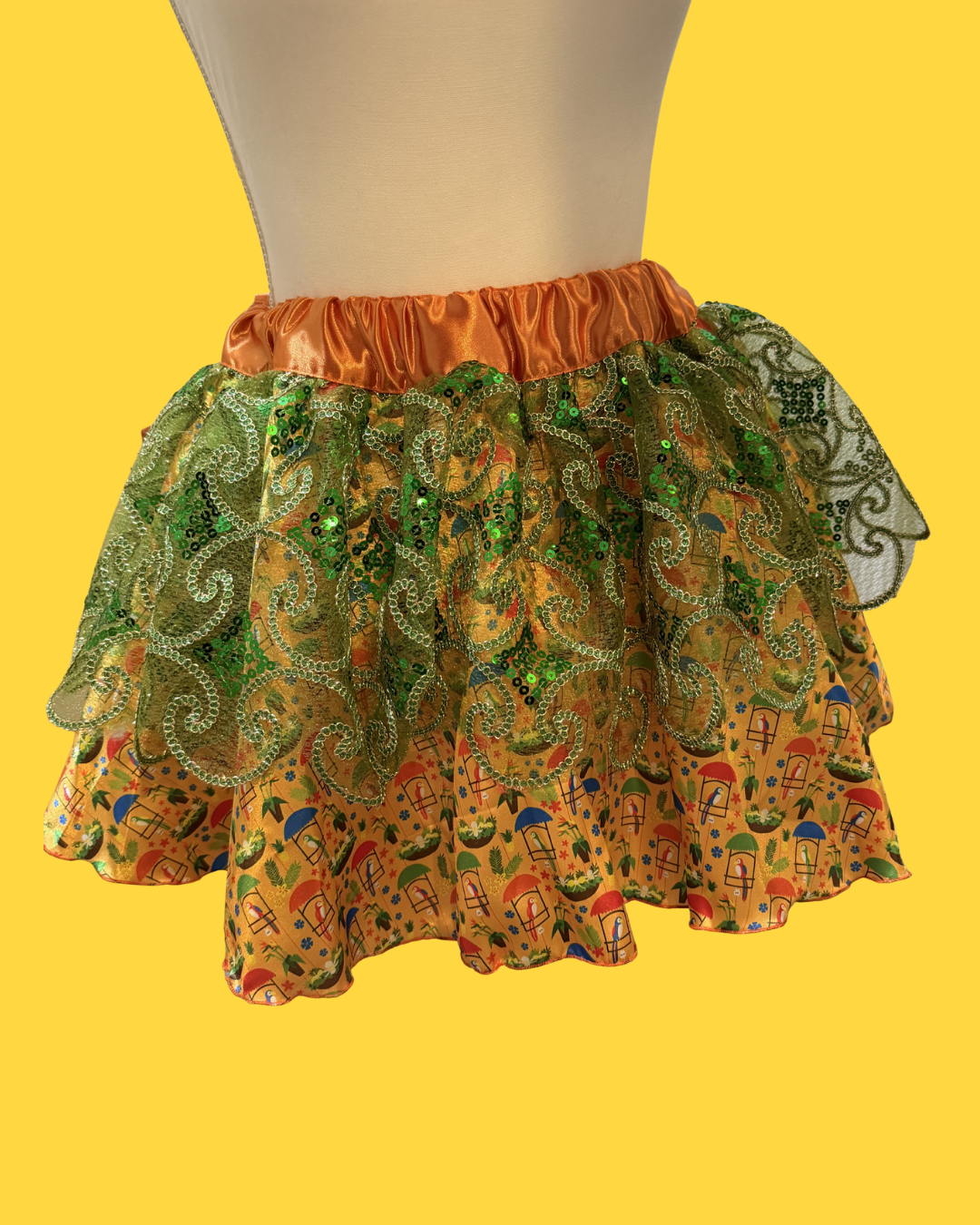 tiki room running tutu Skirt with colorful patterns on a yellow background